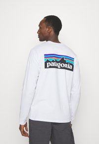 Patagonia - LOGO RESPONSIBILI TEE - Tops ar garām piedurknēm - white Miniatūras attēls 1