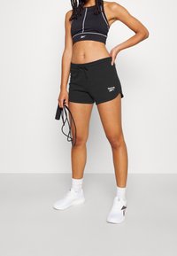 Reebok Urheilushortsit - black