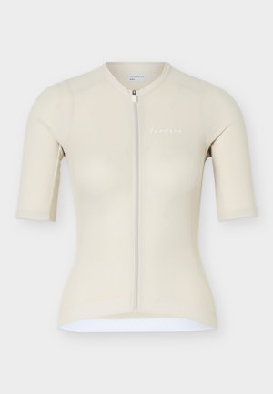 Maglia da ciclismo beige a maniche corte con cerniera frontale e logo "Isadore" sul petto, progettata per una vestibilità slim.