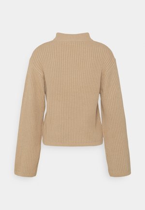 Stickad tröja - sand