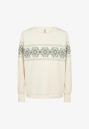 Light cream long-sleeve sweater with black snowflake and heart pattern across the chest. Features ribbed cuffs and a round neckline.