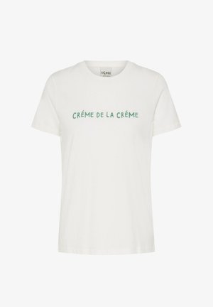 Witte katoenen t-shirt met daarop groene geborduurde tekst "CRÈME DE LA CRÈME" op de borst, ronde hals en korte mouwen.