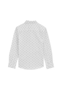 Bela srajca z dolgimi rokavi, ki ima majhen črn trikotni vzorec, ovratnik in gumbaste manšete. Gladka tkanina z rahlo ukrivljenim robom.