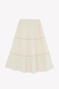 Light beige tiered skirt made of textured fabric, featuring an elastic waistband and decorative horizontal stitching accents.