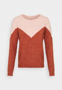 Czerwony i różowy sweter na drutach z wzorem zygzakowym. Długie rękawy, okrągły dekolt, luźny krój, miękka faktura i ściągacz na dole.