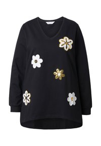 Felpa nera a maniche lunghe con scollatura a V, decorata con fiori applicati in bianco e oro, con diverse dimensioni e textures, e un orlo curvo.
