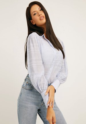 IN KNITTEROPTIK - Camicia - blau