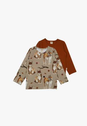 Two long-sleeve children's shirts: one rust-colored solid, one beige with lynx and leaf print.