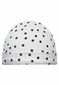 Beanie di cotone bianco con risvolto, caratterizzato da un motivo a pois neri su tutta la superficie. Tessuto morbido con una vestibilità aderente.