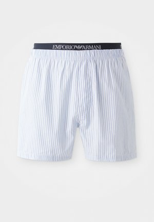 Boxers bleus et blancs à rayures avec une taille élastique arborant le logo noir "Emporio Armani". En coton, coupe décontractée, sans braguette.