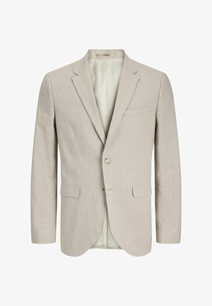 Blazer de color beige claro fabricado en una tela texturizada. Cuenta con dos bolsillos frontales, cierre de un solo botón y solapa con muesca. Interior forrado.