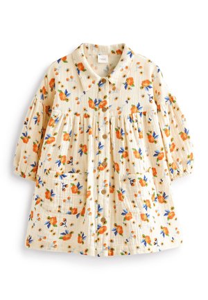 Robe bébé couleur crème avec imprimé floral orange et bleu, manches longues bouffantes, boutons à l'avant, deux poches avant et un col.