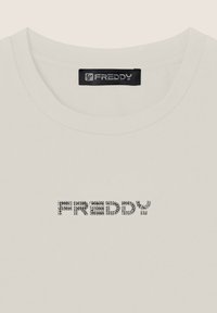 Freddy SENZA MANICHE IN STRETCH CON LOGO STRASS - Body - white sand
