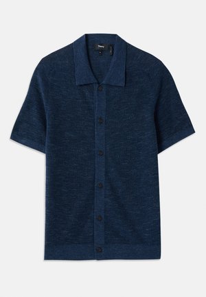 Kraftt skjorte med kort arm i marineblått, med flat krage, som har knappelukking og teksturert stoff. Pyntet med fem svarte knapper.