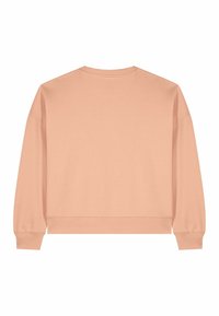 Sweat à capuche couleur pêche, en tissu doux, doté d'un col rond, d'épaules tombantes, et de poignets et ourlet côtelés.