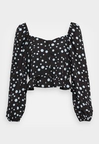 Blusa cropped preta com mangas longas e volumosas, apresentando bolinhas azul-claro, frente com botões e barra franzida. Textura de tecido suave.