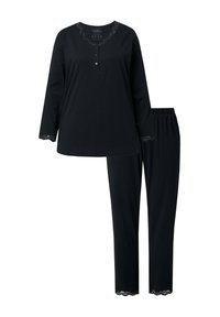 Zwarte top met lange mouwen en kantafwerking bij de halslijn en manchetten, gecombineerd met bijpassende zwarte broek met elastische tailleband en kanten accenten.