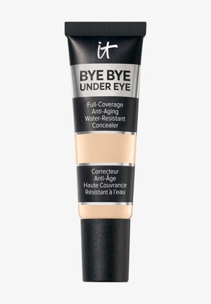 Tubetto di IT Bye Bye Under Eye, correttore a copertura totale, anti-età e resistente all'acqua, con confezione nera e beige.