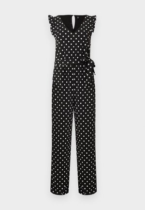 Sort ærmeløs jumpsuit med hvide prikker, V-hals, flæseærmer og et bindebælte i taljen.