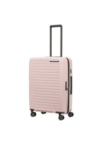 Pink hard-shell suitcase with vertical ribbed design, retractable black handle, zipper, and four black spinner wheels for mobility.