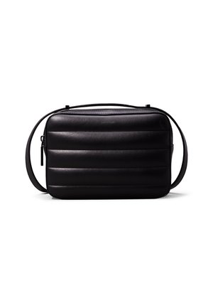 Black rectangular crossbody bag with horizontal padded stripes, top zipper, and adjustable shoulder strap on a white background.
