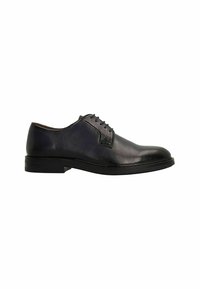 Zwarte leren veterschoen met een ronde neus, een gladde afwerking, gestikte details en een lage rubberen zool.