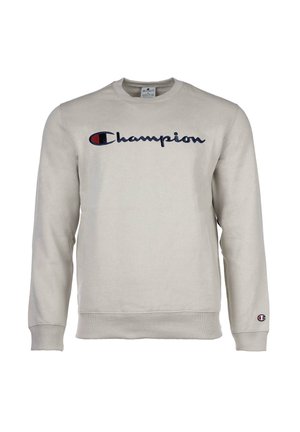 Sudadera gris claro fabricada en una mezcla de algodón, con un logo en marino "Champion" en el pecho y un pequeño parche con el logo en la manga izquierda.