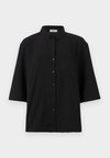 DIVYA 3/4 LOOSE NOOS - Button-down blouse - black