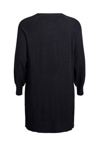 Black knit sweater dress with long puff sleeves, rounded neckline, and a straight silhouette. Features ribbed cuffs and hem.