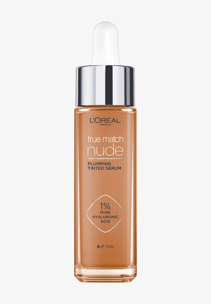 L'Oréal True Match Nude aufpolsterndes getöntes Serum mit Pipette, 1 % reines Hyaluronsäure, Farbton 6-7 tan in einer klaren rechteckigen Flasche.