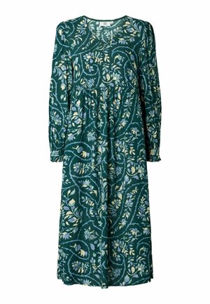 Pitkähihainen tummanvihreä mekko, jossa on kermanvärinen ja sininen kukkainen köynnöskuvio, vyötäröltä kerrostettu ja pyöreä pääntie.