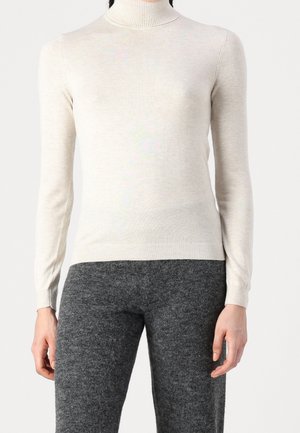Stickad tröja - beige