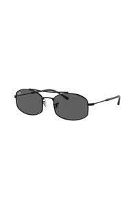 Occhiali da sole in stile black metal con lenti ovali. Presentano una sottile montatura in metallo, lenti scure, un design elegante e dettagli minimalisti sulle cerniere.