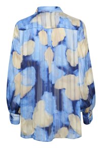 Blouse à manches longues avec motif floral abstrait bleu, beige et marine et fines rayures verticales, poignets boutonnés et col.