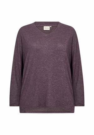 Dlhý rukáv s výstrihom do V v tlmenej purpurovej farbe. Mäkká, štruktúrovaná tkanina s voľným strihom a bočnými rozparkom v dolnej časti pre zvýšený komfort.