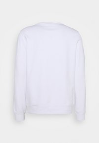 Sweat-shirt blanc uni à manches longues, vu de dos avec poignets et ourlet côtelés sur un fond neutre.