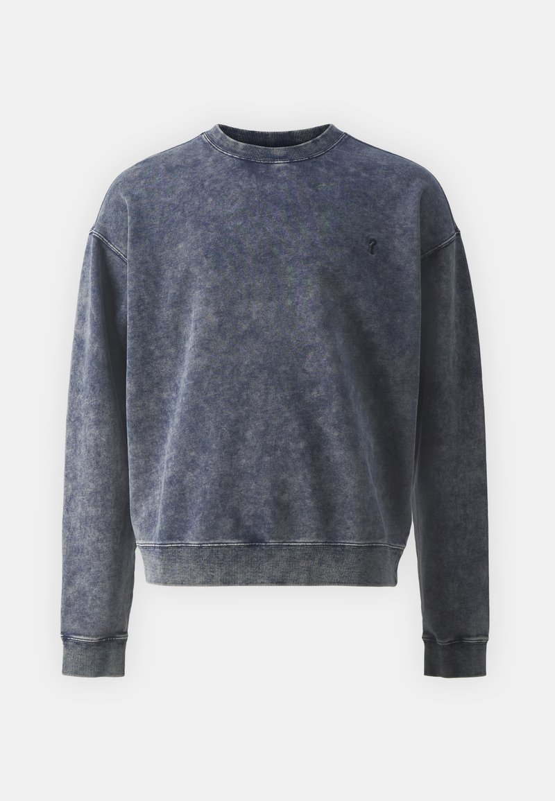 Sweatshirt bleu marine en matériau doux, avec un col rond, des poignets côtelés et un léger effet dégradé, et un petit logo sur la poitrine.