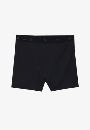 Črne bokserice z ribasto teksturo, ki imajo enobarvni pas z diskretnim vzorcem ter zasnovo do sredine stegna.