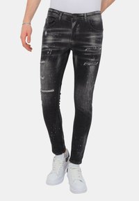 Local Fanatic PAINT SPLATTER DESTROY STOASH - Jeans Skinny Fit - zwart