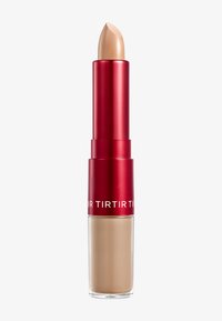 Lipstick i en drej-up tube med en rød metalhætte og gennemsigtig base. Leppen er cremefarvet med en glat, rund spids.