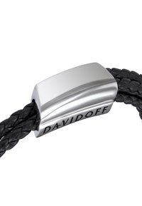 Braided black leather bracelet with a polished silver metal clasp, featuring engraved "DAVIDOFF" on the side.