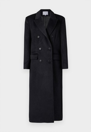 Cappotto in lana nera doppiopetto con rever, maniche lunghe e silhouette dritta. Presenta due tasche frontali e bottoni decorativi.