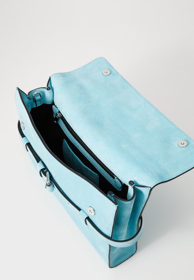 Light blue suede handbag with a structured design, featuring a top flap, silver hardware, and a zipped interior pocket.