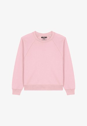 Helepunane heleroosa dressipluus ümara kaelusega, raglaanvarrukatega ning soonikkoes ääre ja mansettidega. Valmistatud pehmest ja siledast materjalist. Siseküljel on logo silt.