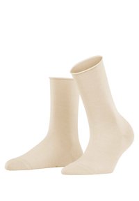 Beige Baumwollsocken mit gerippter Struktur, knöchellang, glatter Spitze und verstärkter Ferse. Einfaches Design ohne sichtbare Muster oder Akzentuierungen.