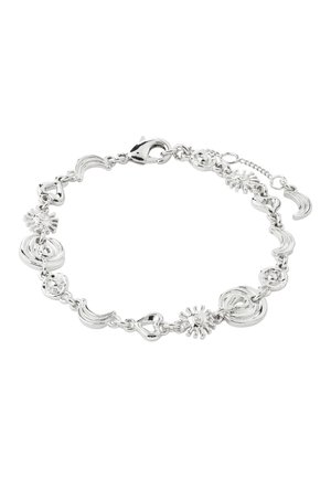 Silver charm bracelet with heart, sun, spiral, crescent moon, and smiley face charms arranged in a circular pattern with lobster clasp.