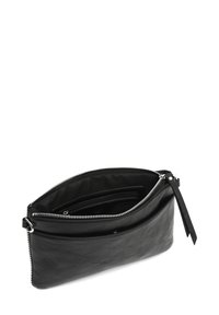 Čierna kožená clutch kabelka so zipsovým uzáverom, s textúrovaným povrchom a vnútornými priehradkami pre lepšiu organizáciu. Obsahuje odnímateľný popruh.