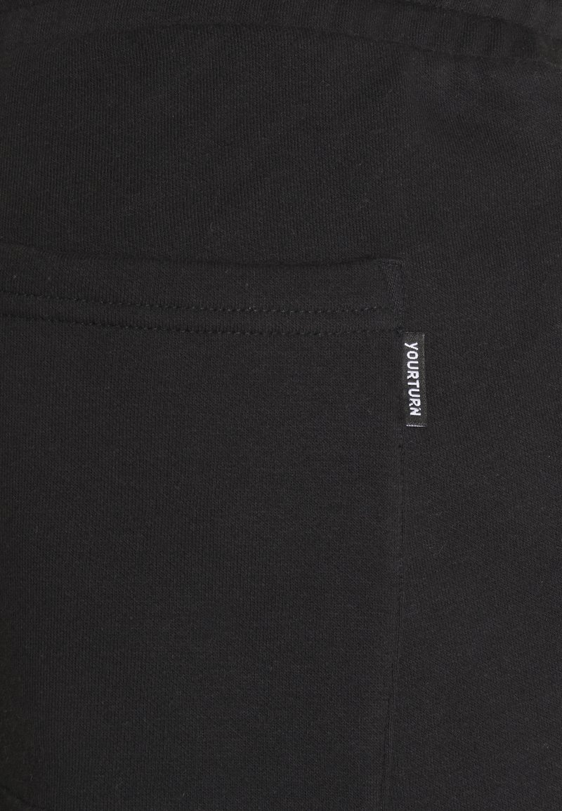 Herren Trainingsanzüge | YOURTURN UNISEX Jogginghose black/schwarz - XY08934 Herren Trainingsanzüge | YOURTURN UNISEX Jogginghose black/schwarz - XY08934