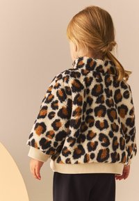 Next Flísová bunda - animal print