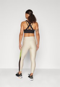 Puma FIT EVERSCULPT FASHION - Pajkice – hlače - putty